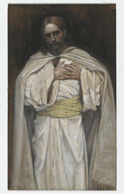 James Tissot painting of Jesus standing in a white robe and prayer shawl, one hand over his chest